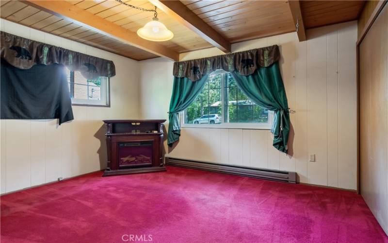 Love these beamed ceilings in this cabin home