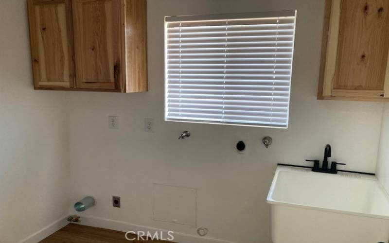 Laundry Room with 4 cabinets & wash sink