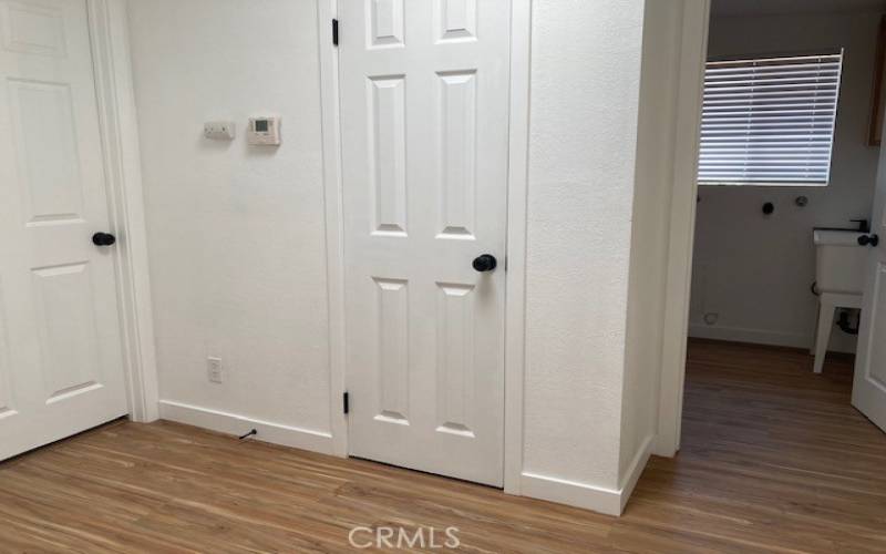 Hallway off bedroom 1 and Laundry Rm., linnen closet