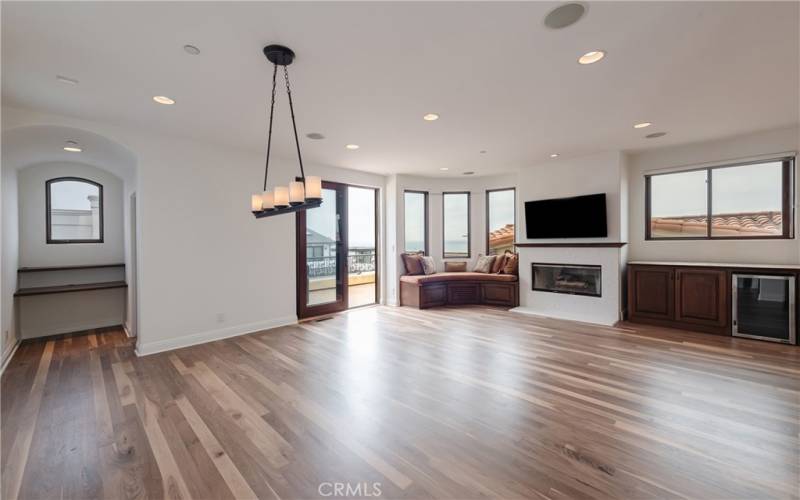 Living/dining area as viewed after you come upstairs: your dining area would be under the light fixture, a convenient office nook tucked out of the way off to the left...near the powder room