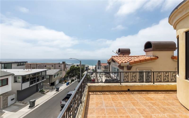 This is what it's all about...ocean view balcony/deck right of the living area. There's a BBQ too.