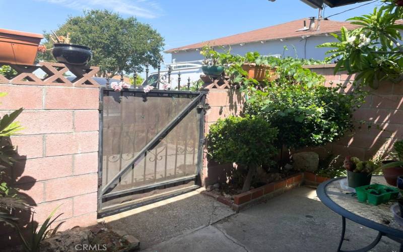 GATED ENTRANCE WITH GARDENS