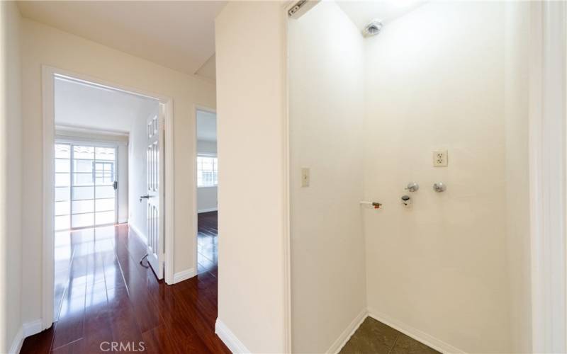 Upstairs closet converted to a washer/dryer closet with hook-ups.