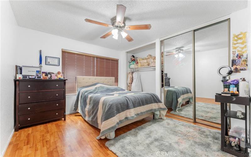 Four of five bedrooms with ceiling fan.