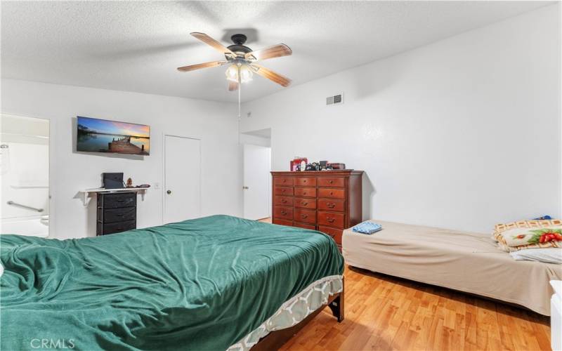 Primary bedroom with walk in closet and en suite.