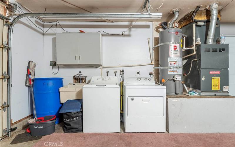 Laundry is located in the garage.