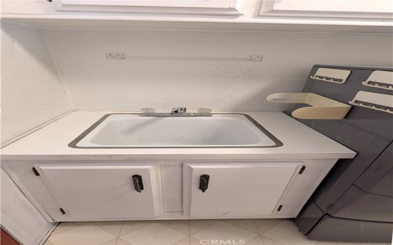 Sink & Cabinet in Laundry