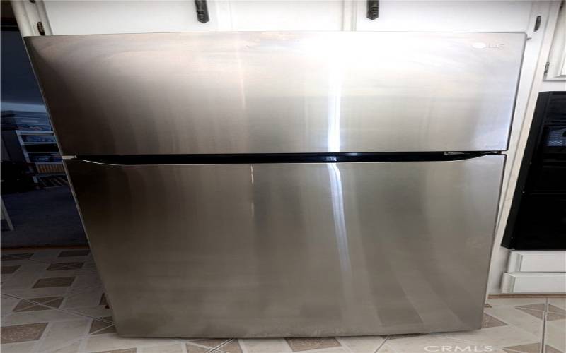 Stainless LG Refrigerator is approx. 6 mos New and is included with Sale