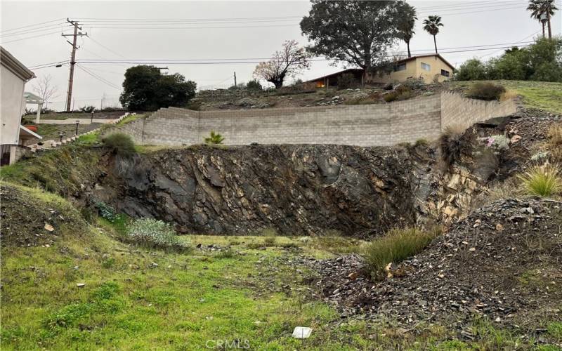 graded lot with retaining wall in place