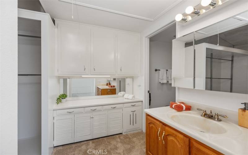 Upstairs walk-in closet and vanity area