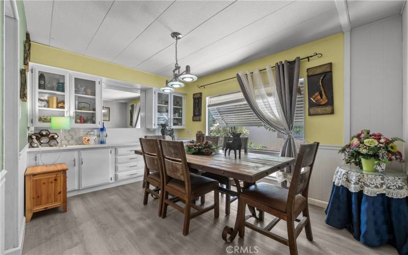 Dining room with a lovely built in showcase for all your favorite dishes or decor!