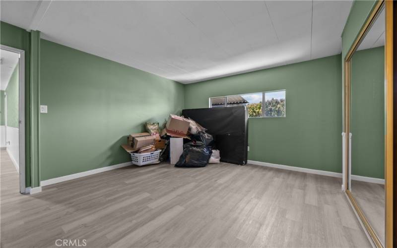 Mirrored closet doors and new flooring