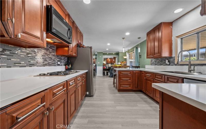 Kitchen also leads to a playroom/den/family room or bonus room!