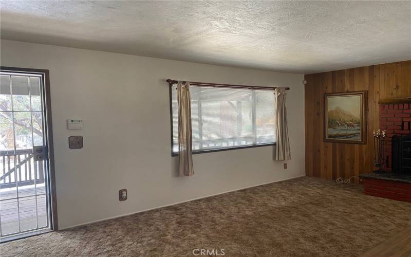 Living room front door and front window