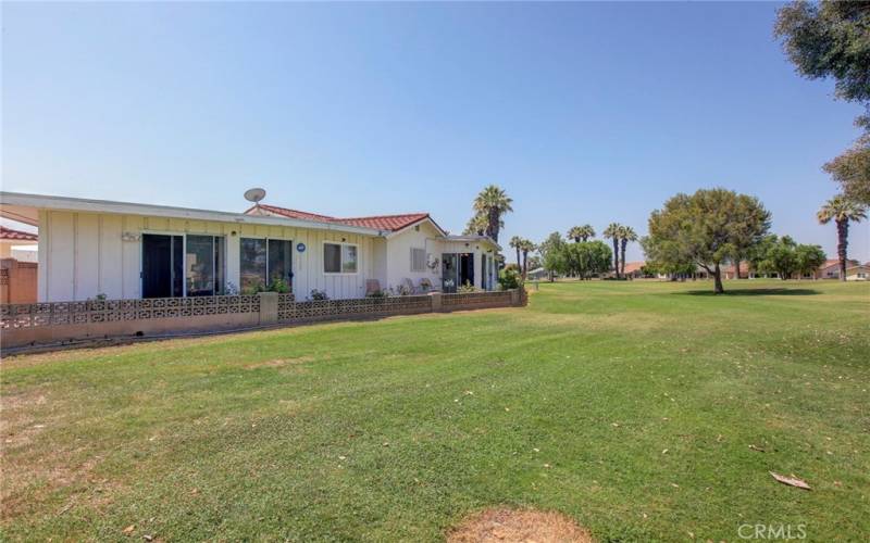 View of bonus room at left as seen from golf course.