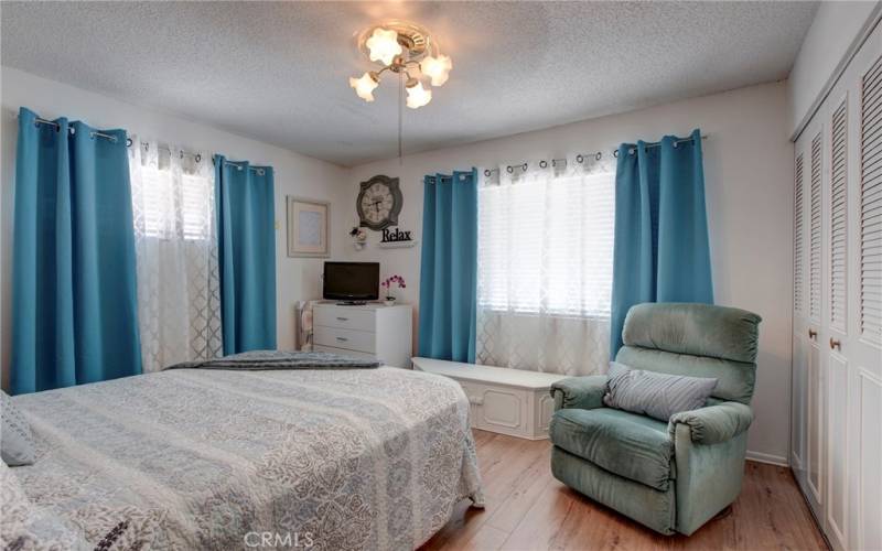 Secondary bedroom with window to street.