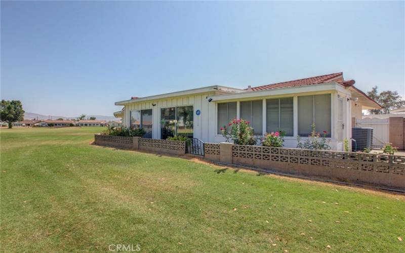 View of back of house from golf course.