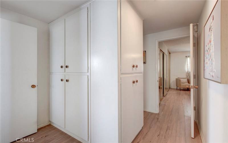 Bedroom hallway boasts 2 large separate storage closets.