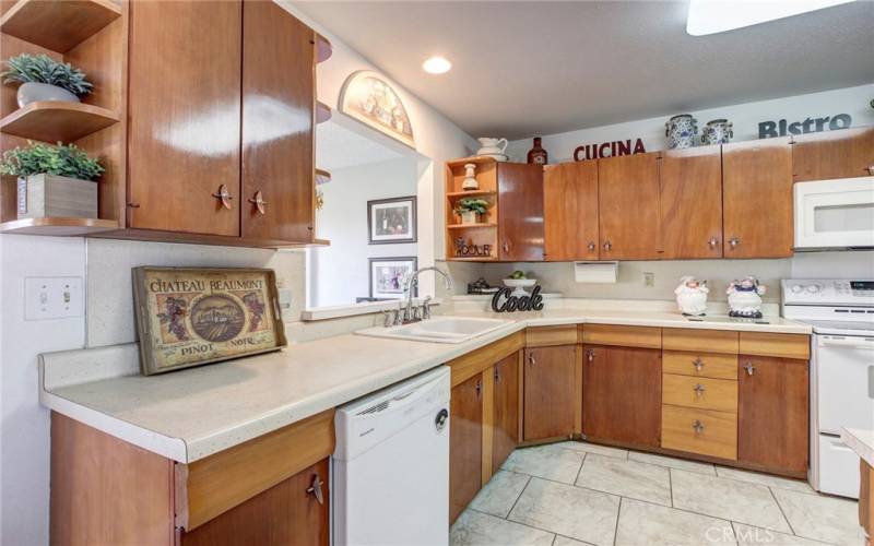 Kitchen has pass thru to dining room.