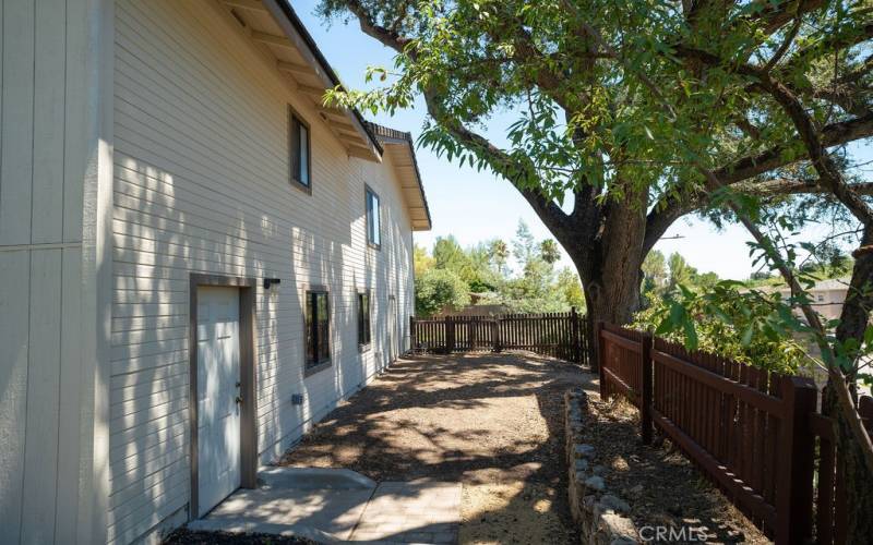 Side yard and access to basement and wine cellar