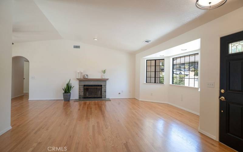 Living room with wood Burning Fire Place