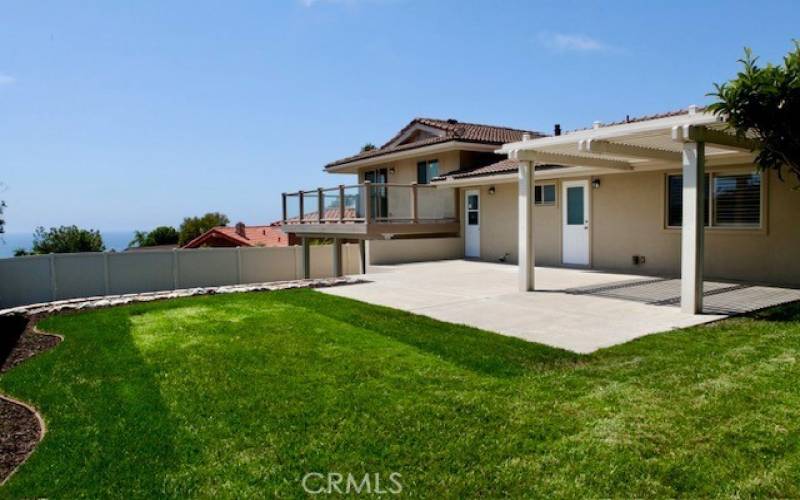 Large landscaped fenced in back yard