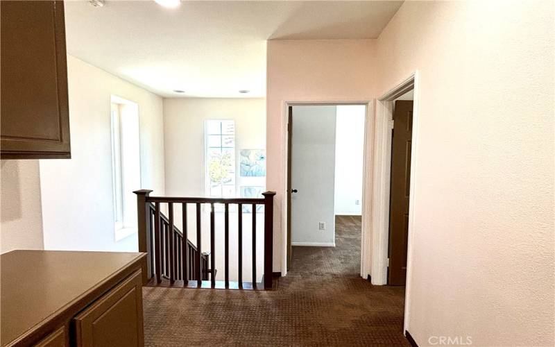 Tall windows brighten the stairs