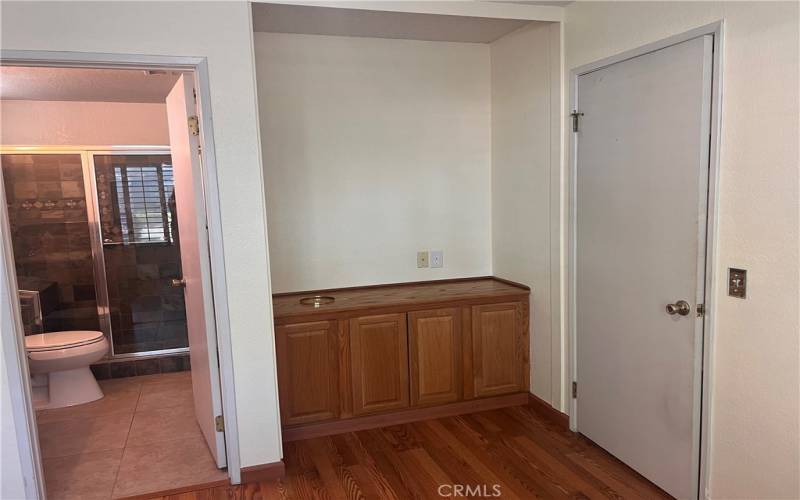 Downstairs bedroom used as an office. May have closet doors.