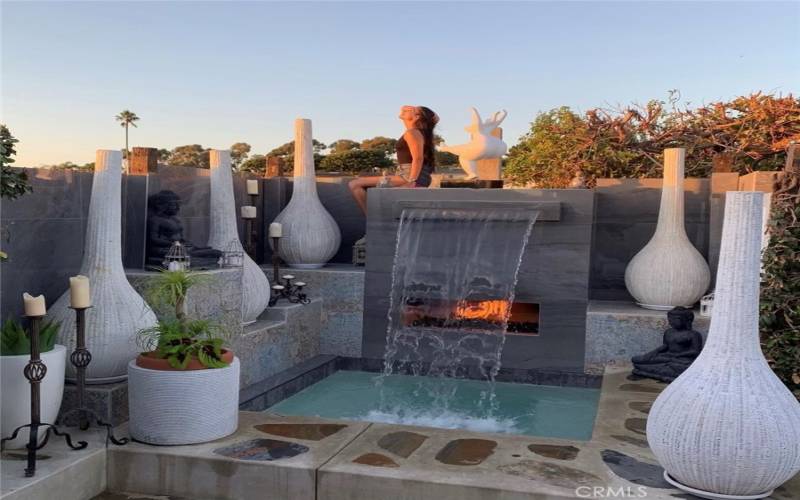 Set the Scene with the Fire Waterfall Hot Tub