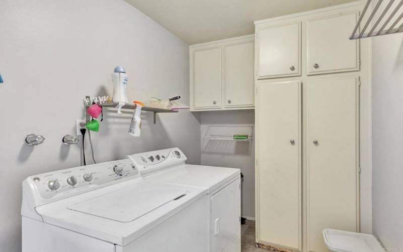 Well-placed laundry room between the garage and main part of the home