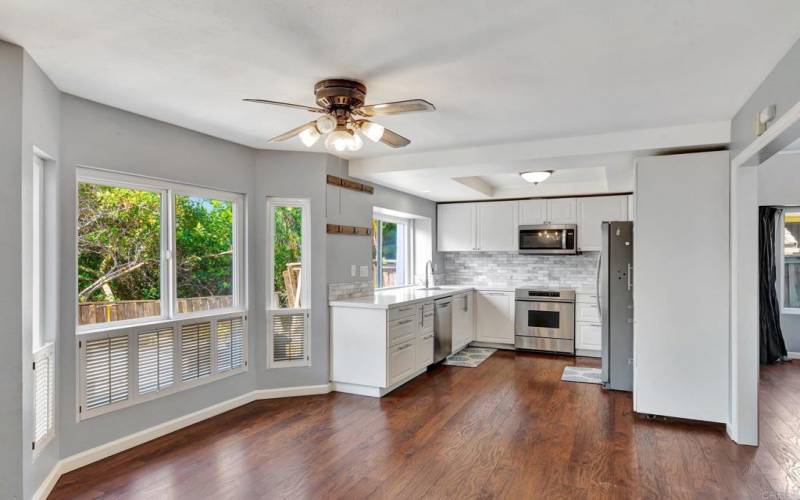 Plantation Shutters and plenty of windows for more natural light to shine through and you to enjoy