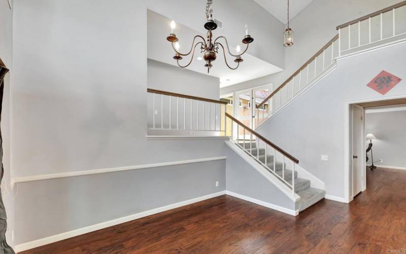 View from the formal dining room back toward the stairs and the Bar Area leading to the LR