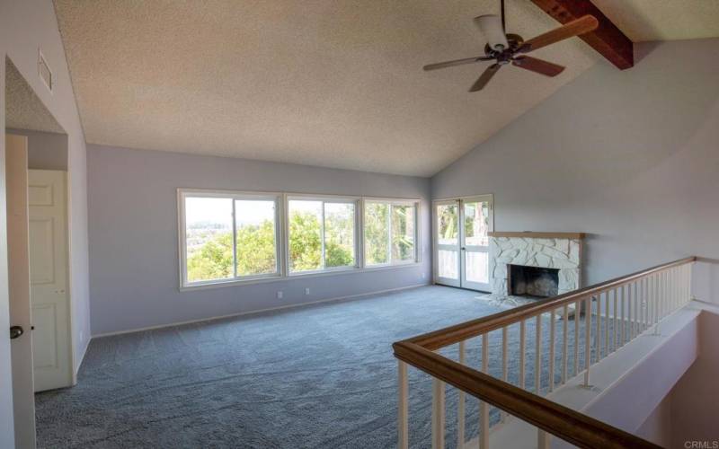 Beautiful, big space with a Fireplace and lots of natural lighting with views to the hills/mountains