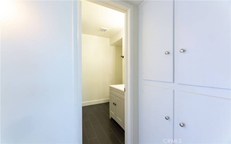 Downstairs linen closet and 3/4 bath