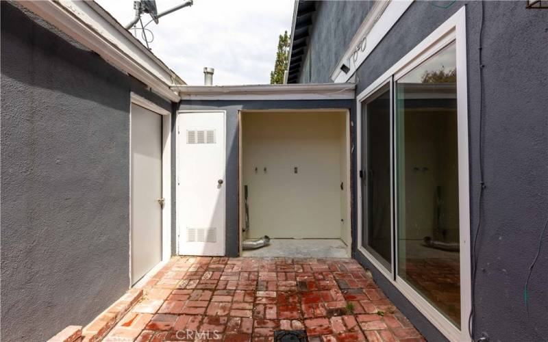 Patio w/ laundry and garage access