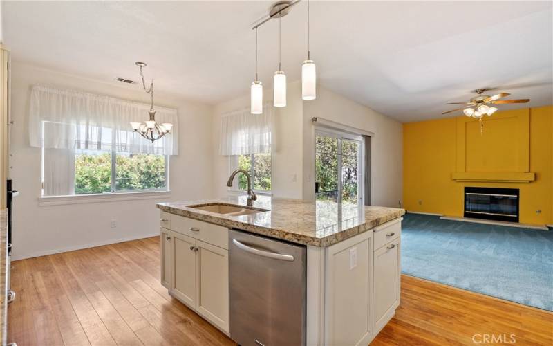 Back inside, the open floor plan allows the kitchen to flow nicely into the family room.