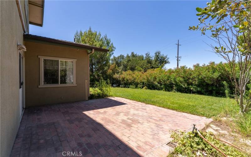 Stepping out from the family room sliding door, there is so much fun to have outdoors! The corner lot allows a wrap-around backyard. Savor the barbecues on the brick patio and playing on the lush lawn.