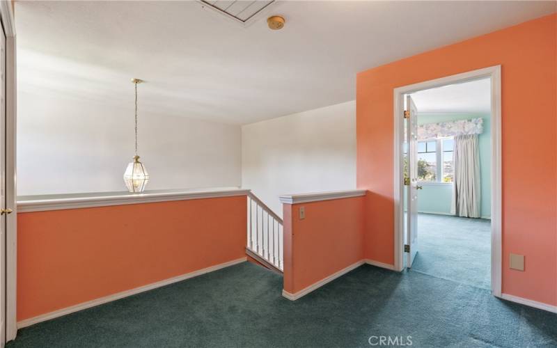 This open space allows access to the upstairs bedrooms and bathrooms as well as a nice linen closet.