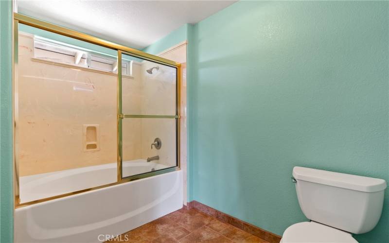 Ensuite bathroom has a separate tub/shower and commode room.