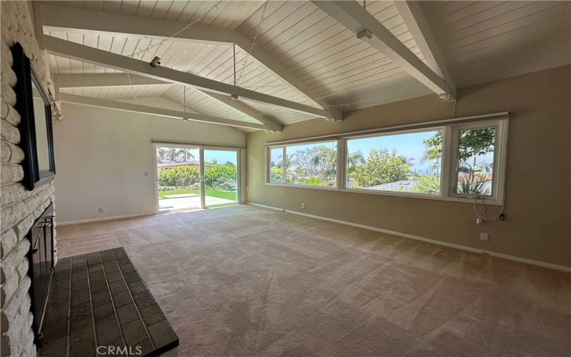 LIVING ROOM w/ PANORAMIC OCEAN VIEW LEADING TO PATIO