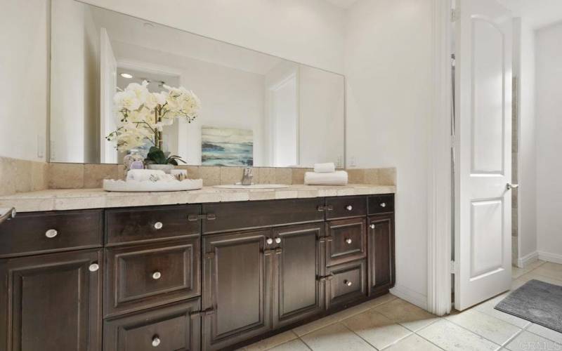 Oversized vanity with private water closet and Tub with Shower