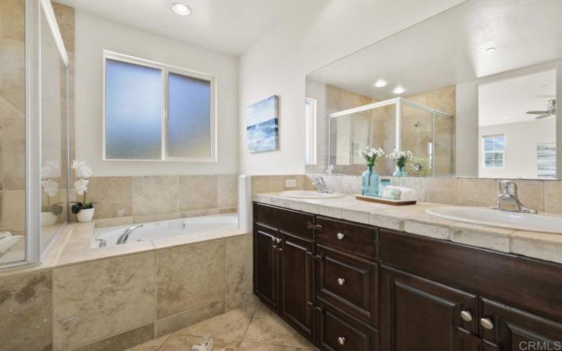 Primary Bathroom with Dual Sinks/Vanity, Walk-In Shower, jetted jacuzzi tub and private water closet