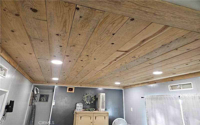 custom wood ceiling in cottage 2 adds character