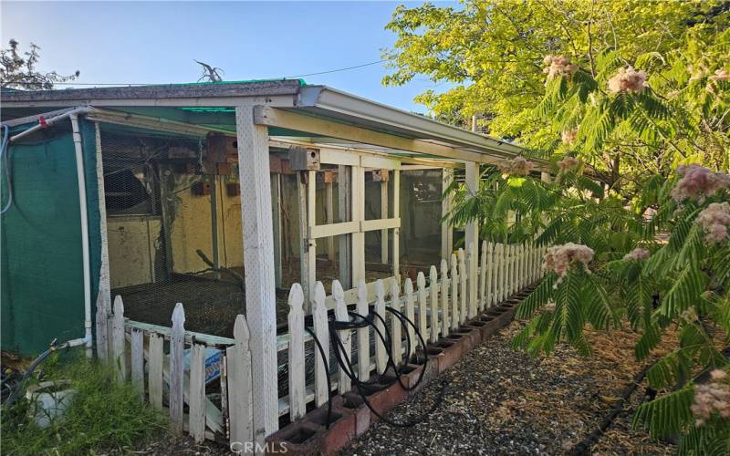 Chicken coop on the front of cottage 1