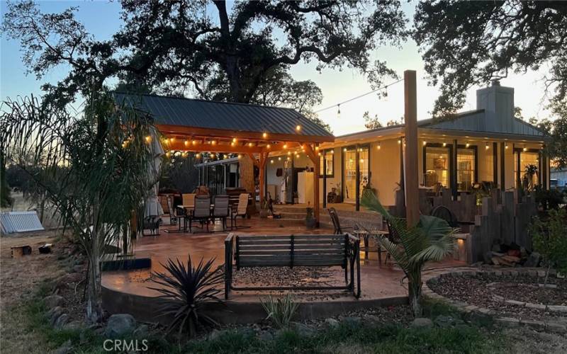 Step out the back and enjoy the huge stamped concrete patio just made for gathering