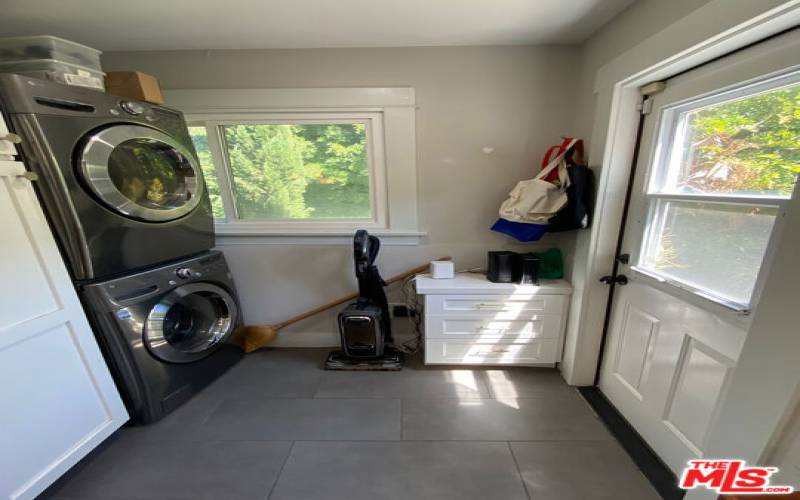 Laundry and door to backyard