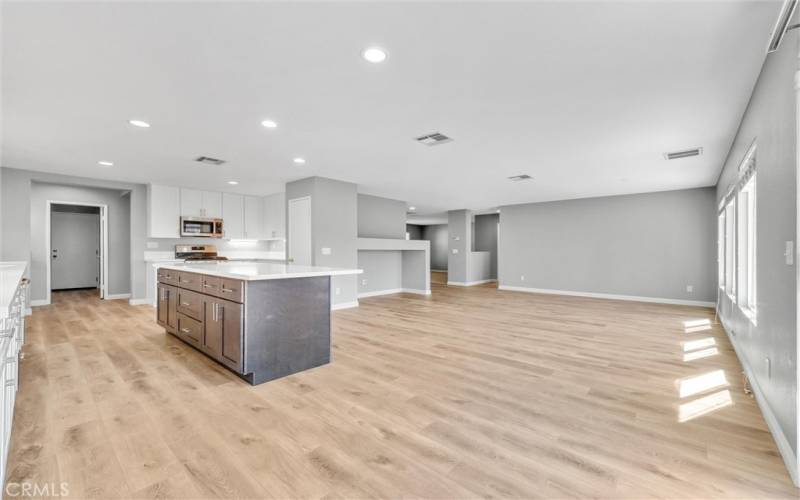 The open layout of great room and kitchen