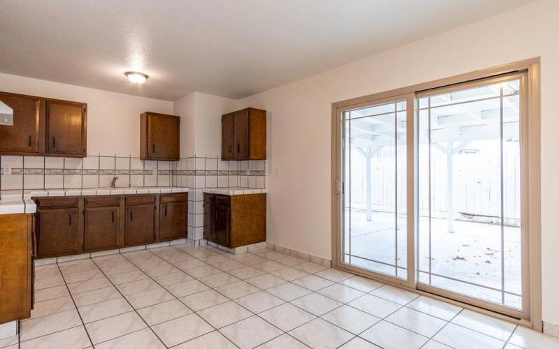 Main home kitchen - tile floors, tile counters