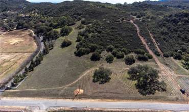 Tenaja Road  frontage from  pines  on  left to the  first  drive, then  all the  way  back to the  Oaks on  parcel  4