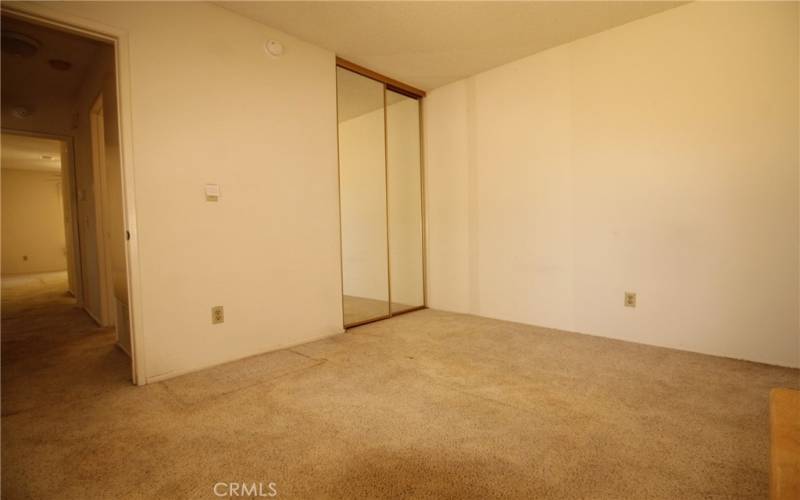 Bedroom 2 has mirrored closet doors